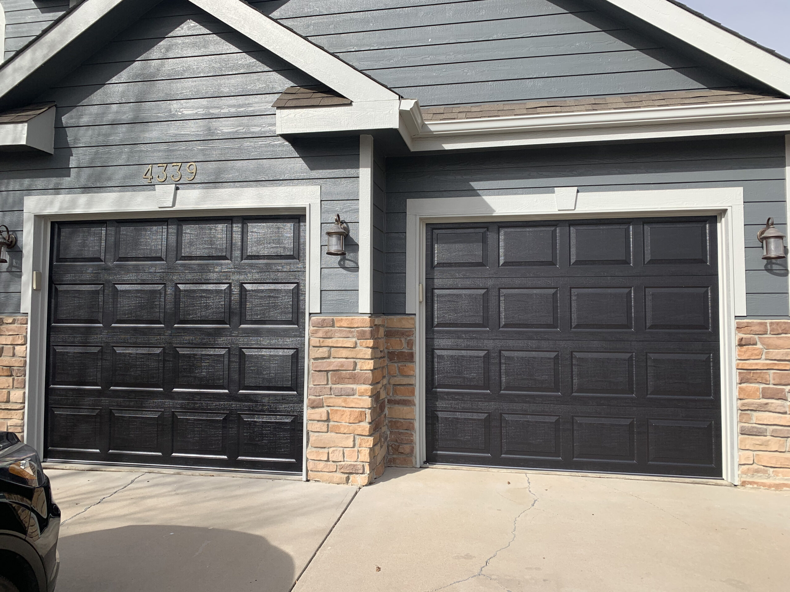 Black garage doors installation